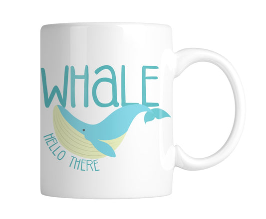 White mug with a blue whale and “Whale Hello There”, handle on the right
