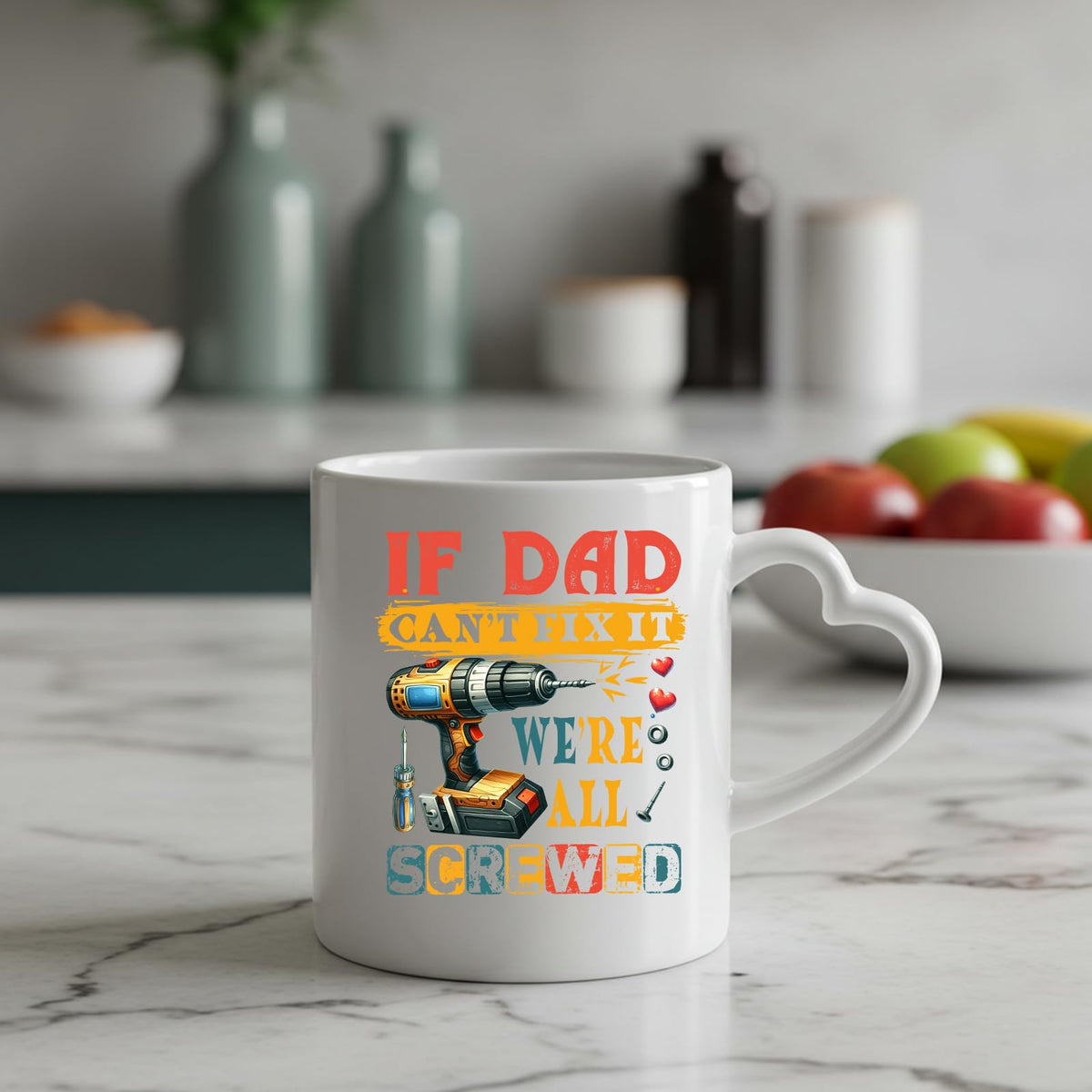 If Dad Can’t Fix It heart-handle mug on a marble counter with fruit