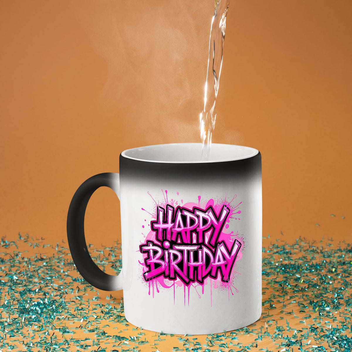 Hot water poured into the Happy Birthday pink drip colour changing mug as the design appears