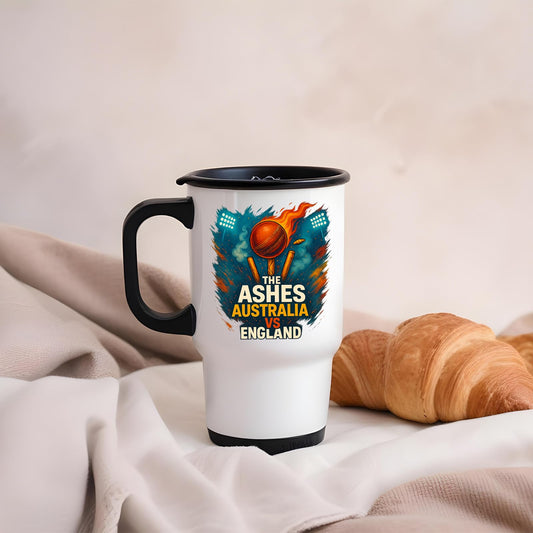 Ashes travel mug on linen beside a croissant