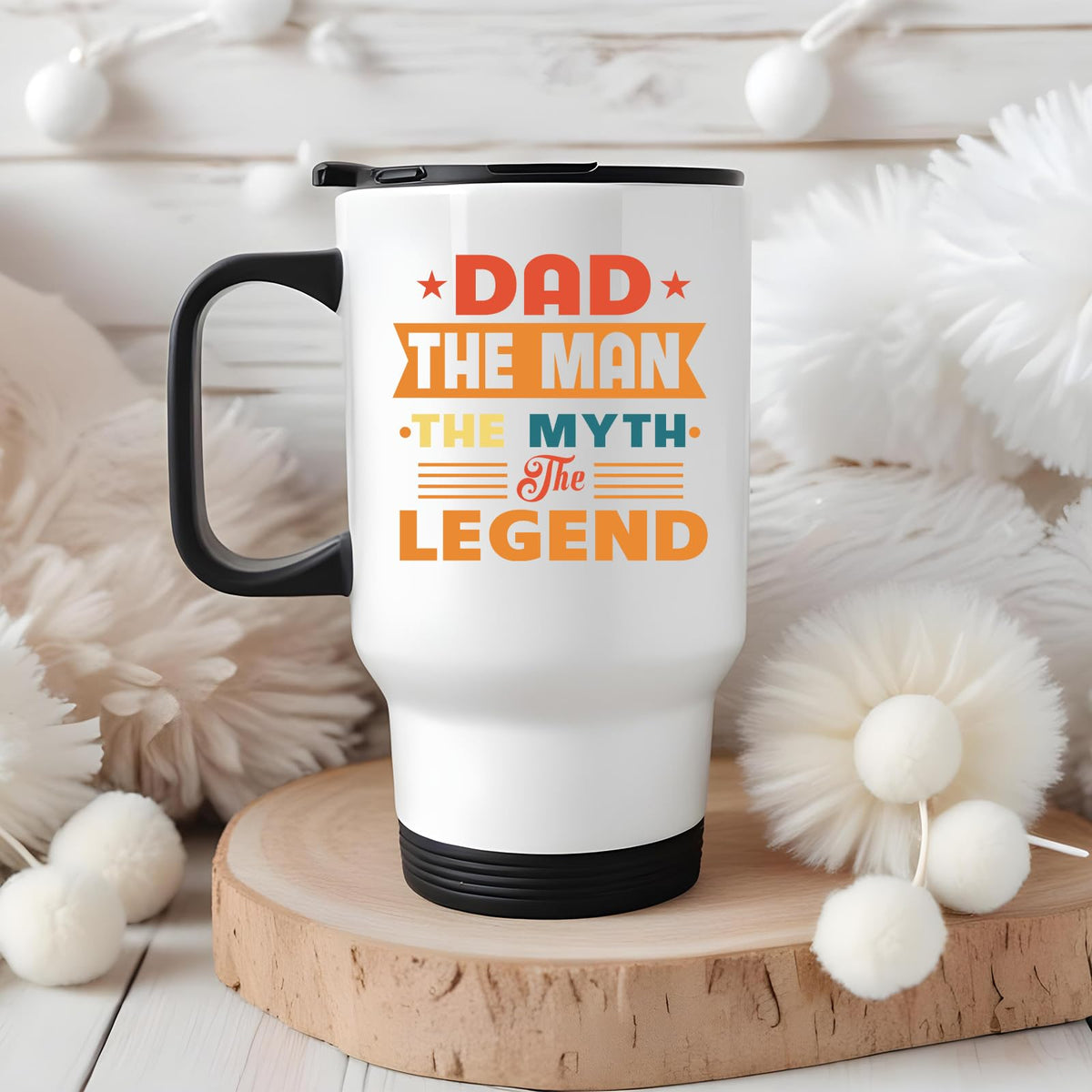 Dad the Man retro travel mug on a wooden slice with white pom-poms