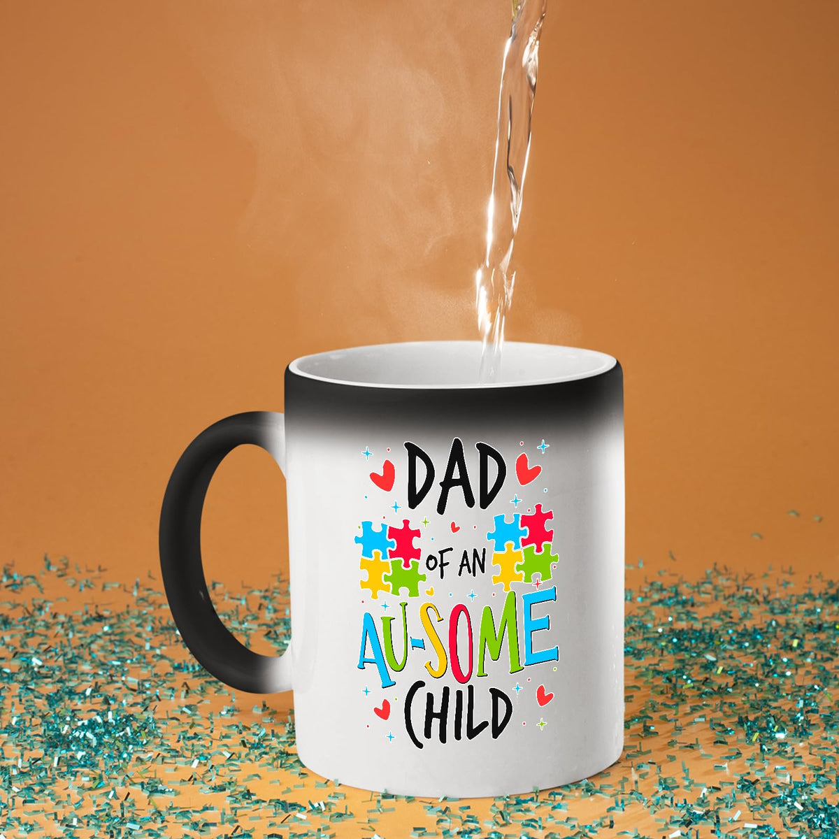Hot water poured into the Dad of an Au-Some Child colour changing mug as the design appears