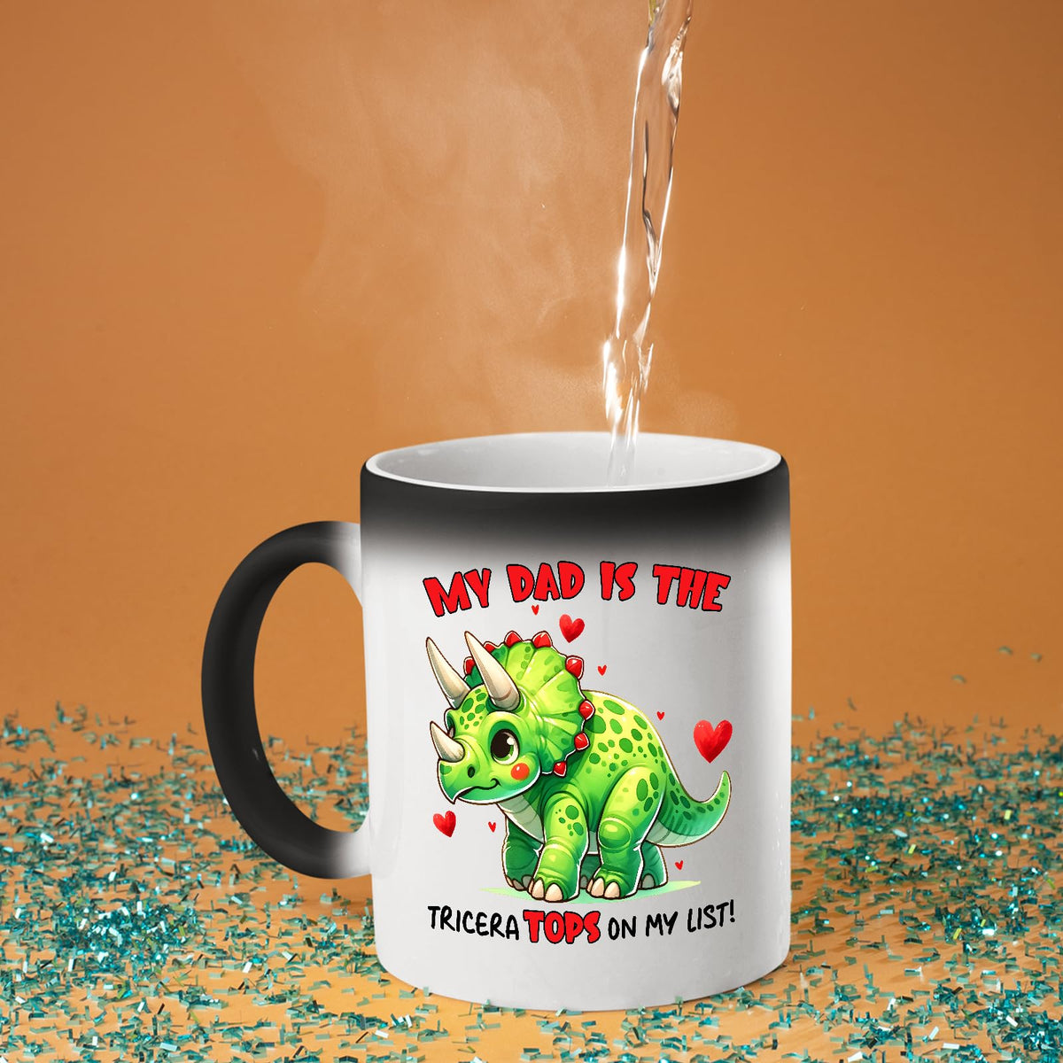 Hot water poured into the Triceratops dad colour changing mug as the design appears