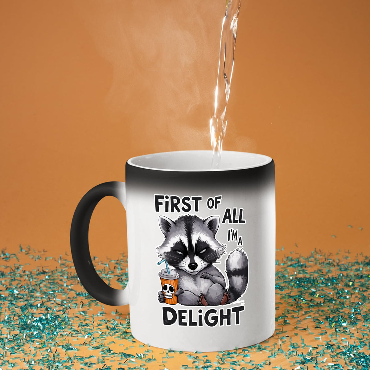 Hot water poured into the First of All I’m a Delight raccoon colour changing mug as the design appears