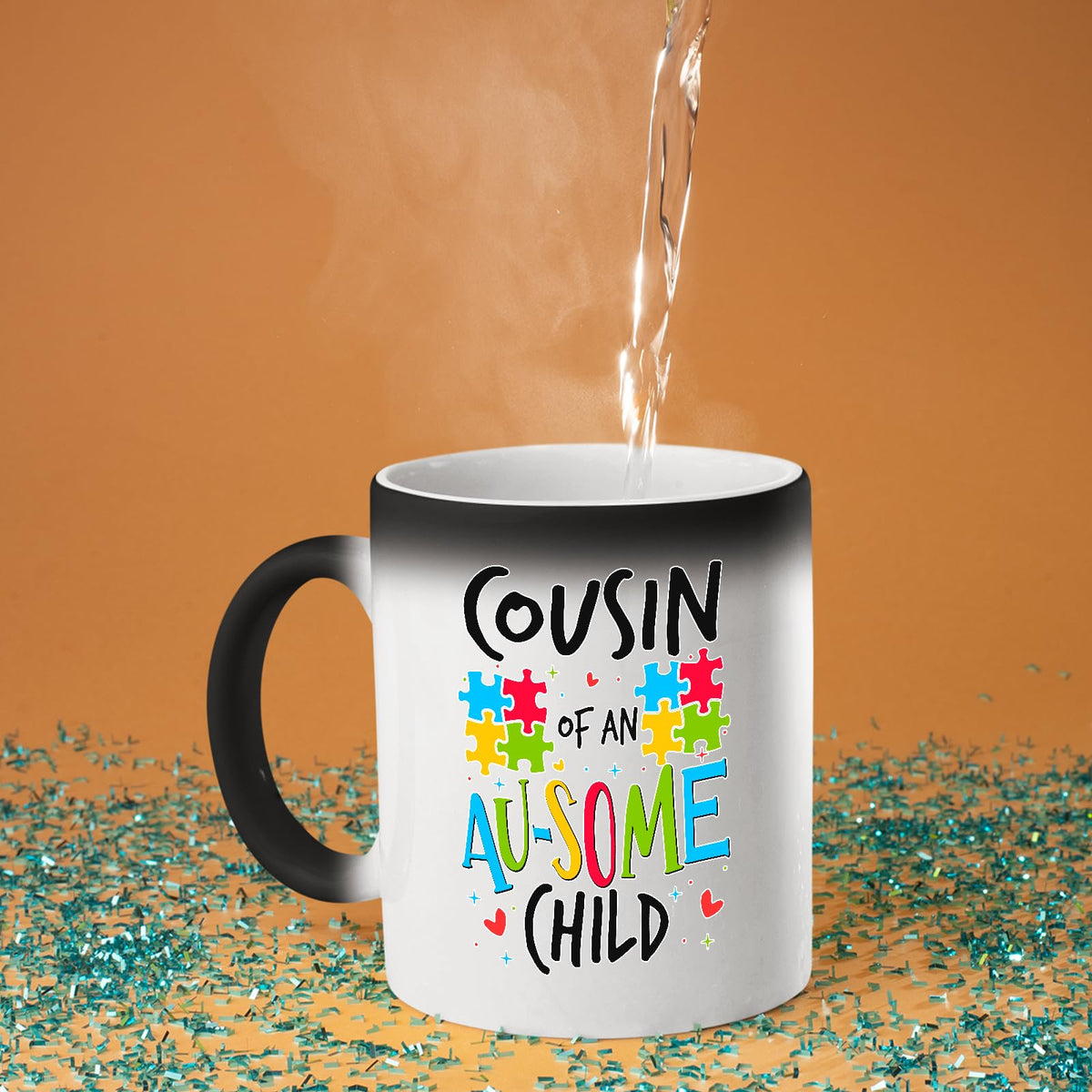 Hot water poured into the Cousin of an Au-Some Child colour changing mug as the design appears