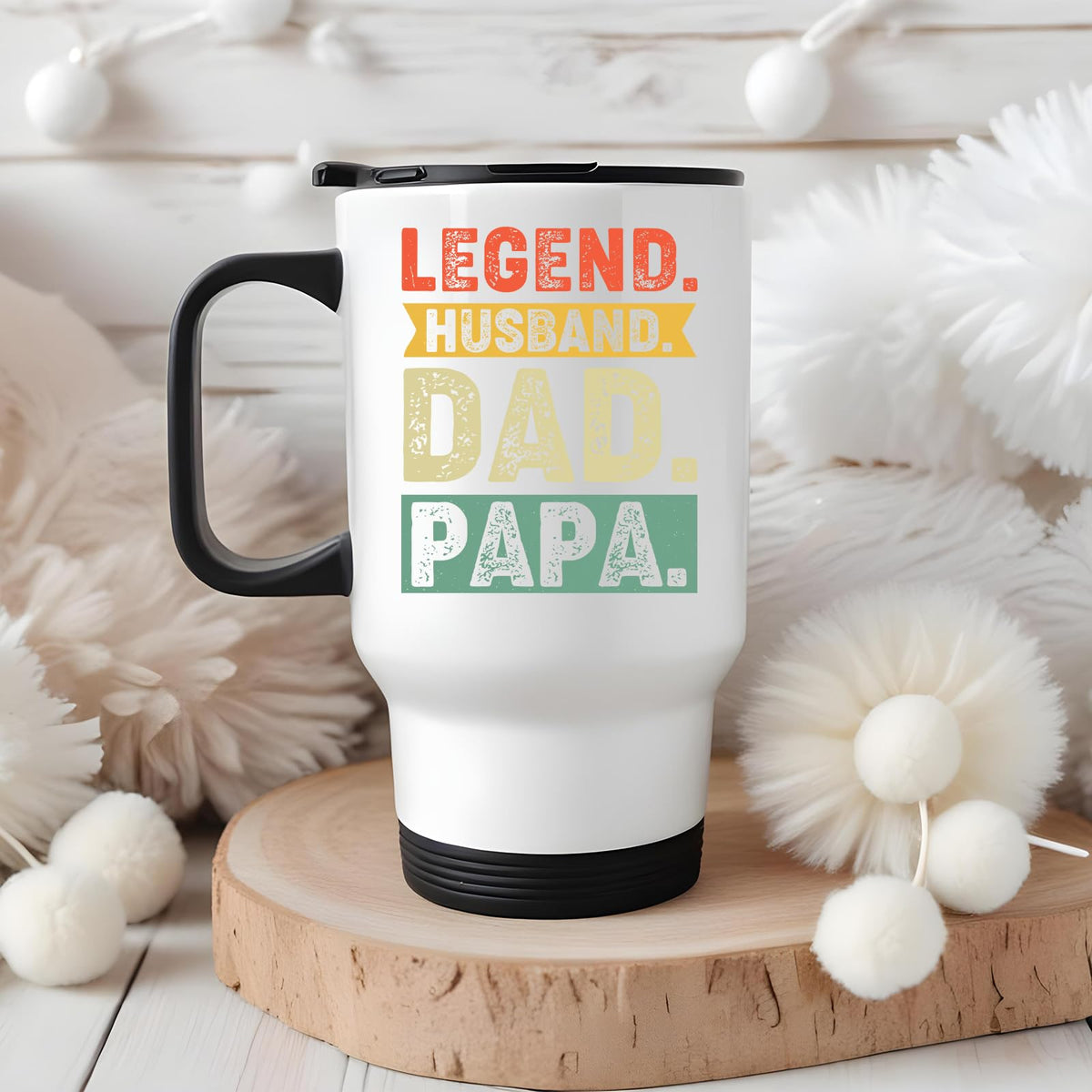 Legend Husband Dad Papa travel mug on a wooden slice with white pom-poms