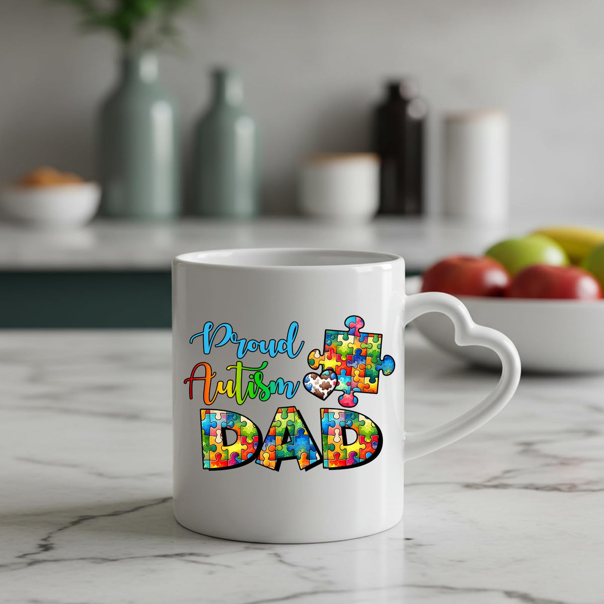 Proud Autism Dad heart-handle mug on a marble counter with fruit