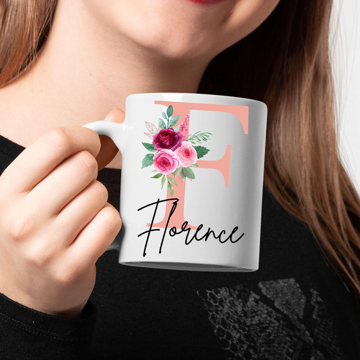 Woman holding a personalised initial name mug