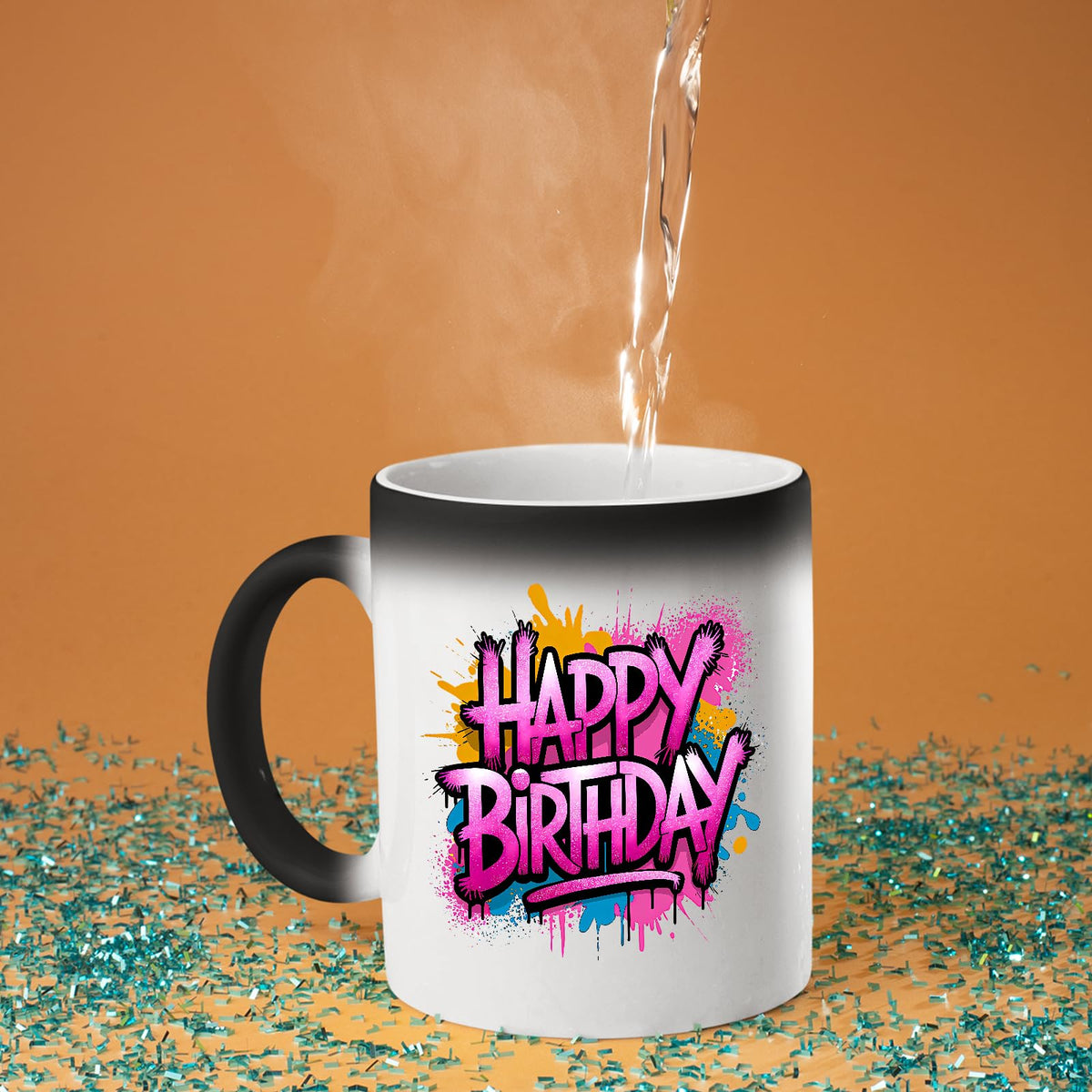 Hot water poured into the Happy Birthday pink graffiti splash colour changing mug as the design appears