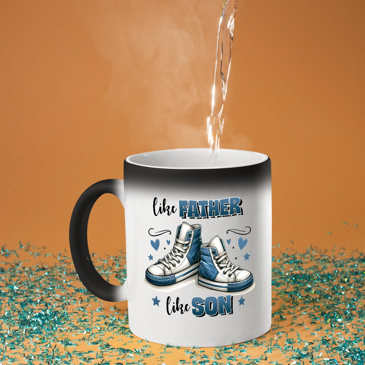 Hot water poured into the Like Father Like Son colour changing mug as the design appears