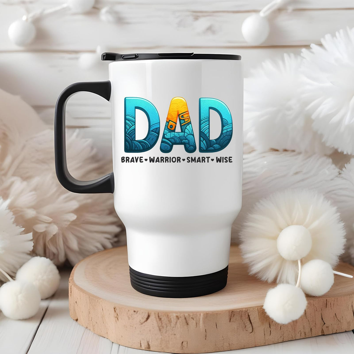 DAD Brave Warrior travel mug on a wooden slice with white pom-poms