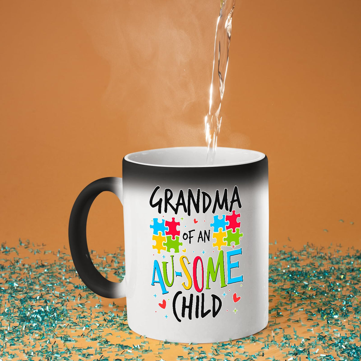 Hot water poured into the Grandma of an Au-Some Child colour changing mug as the design appears