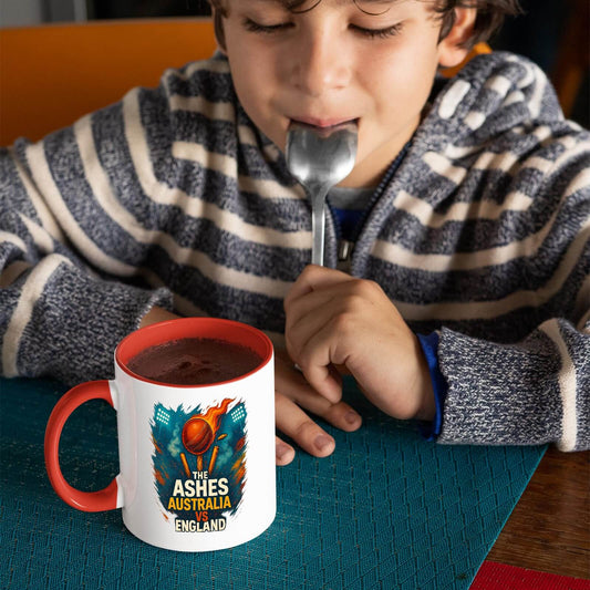 Child drinking from the Ashes red handle mug