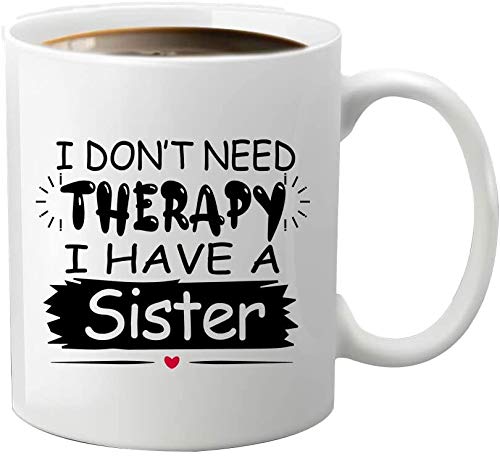 White mug printed with “I Don't Need Therapy, I Have a Sister” in bold black lettering