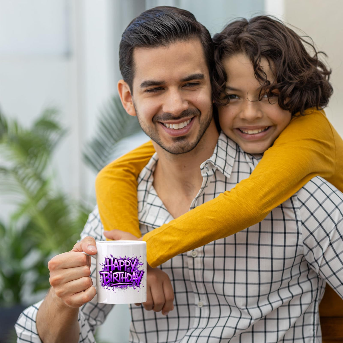 Father and son with the Happy Birthday mug