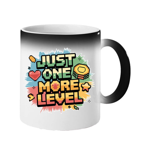 Colour changing mug revealing a retro “Just One More Level” design with a heart and star