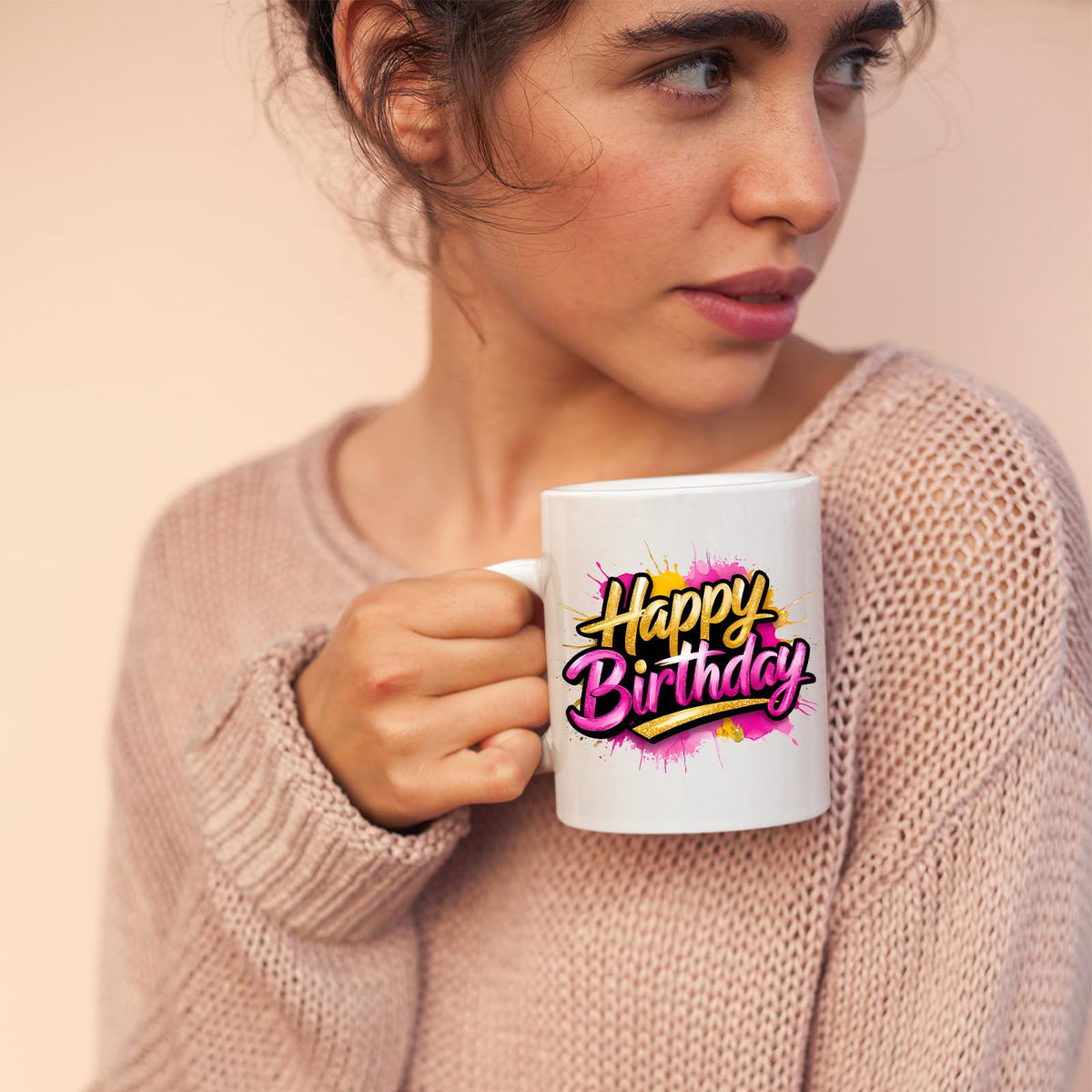 Woman sipping from the Happy Birthday mug