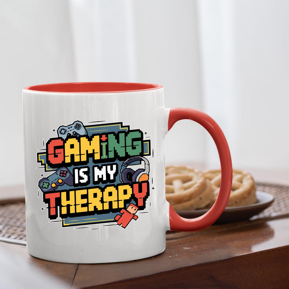 Mug with a red handle beside biscuits