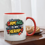 Mug with a red handle beside biscuits