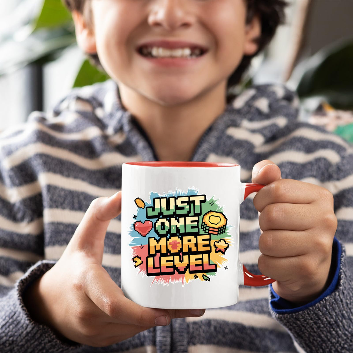 Smiling child holding the colour handle mug