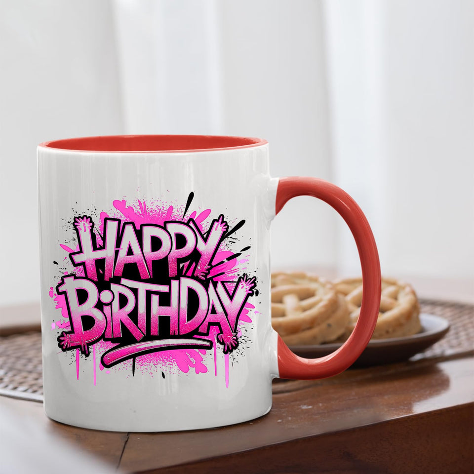 Mug with a red handle beside biscuits