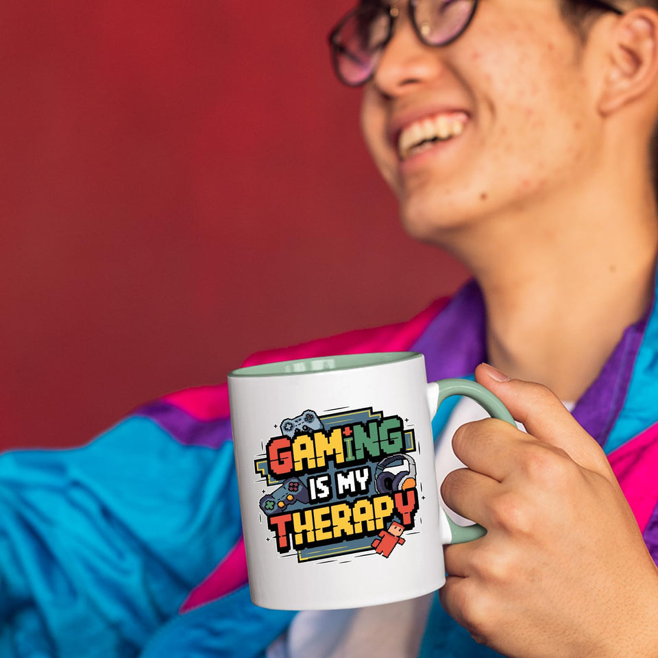 Smiling man holding the colour handle mug