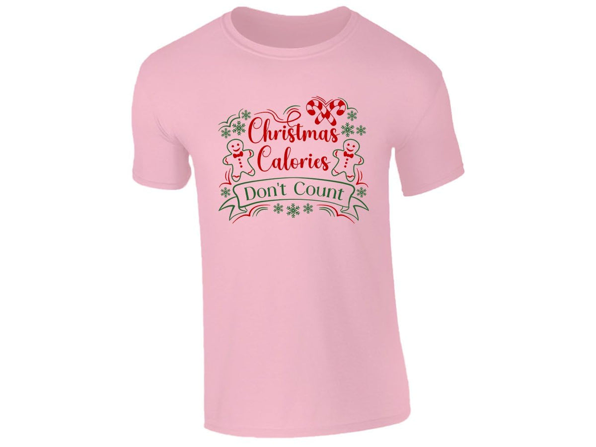 Light pink kids T-shirt with Christmas Calories Don't Count, gingerbread men and candy canes
