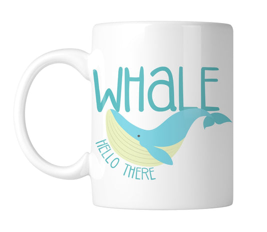 White mug with a blue whale and “Whale Hello There”, handle on the left