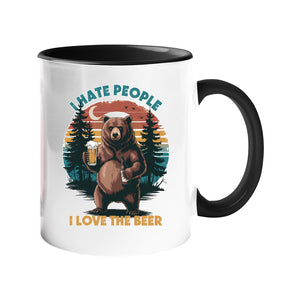 Colour handle mug with a bear holding a beer against a retro forest sunset with “I hate people, I love the beer” – black handle and inside