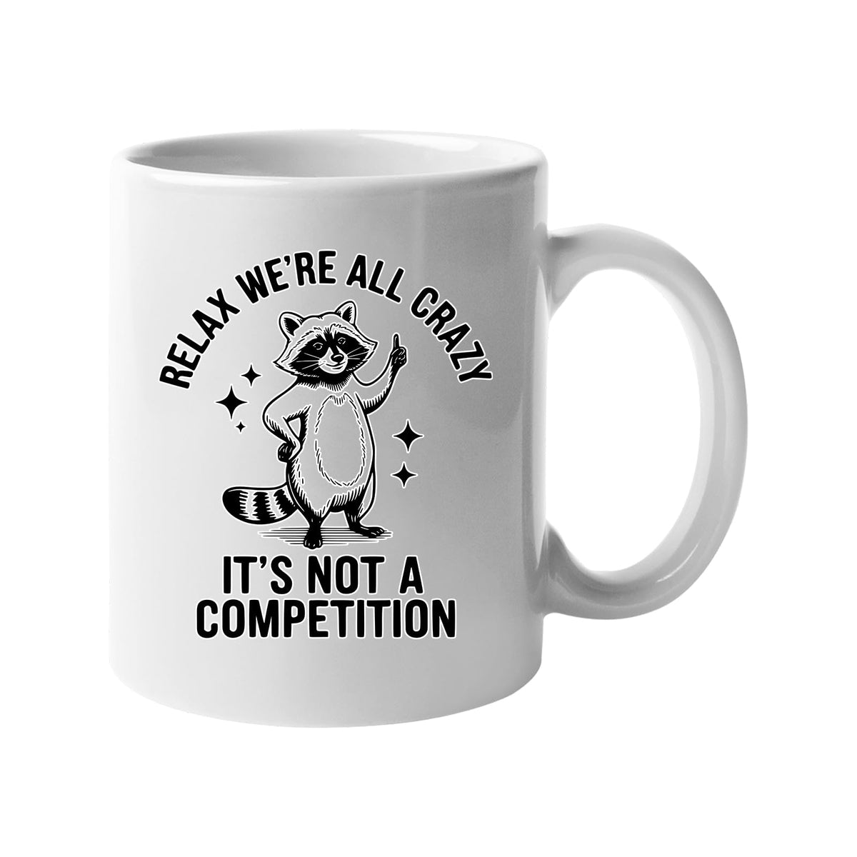 White mug with a raccoon and “Relax, we’re all crazy – it’s not a competition”