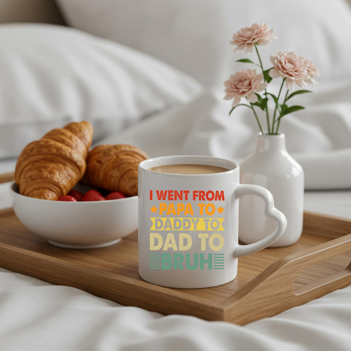 Papa to Bruh heart-handle mug on a breakfast tray with croissants and flowers