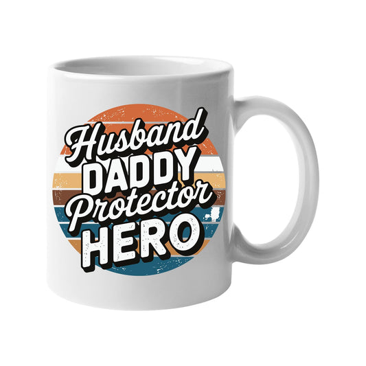 White mug with “Husband, Daddy, Protector, Hero” over a retro sunset circle