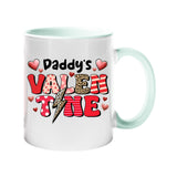 Colour handle mug with “Daddy’s Valentine” in patterned letters with hearts and a leopard lightning bolt – lime handle and inside