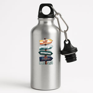 Silver aluminium water bottle with wooden signposts spelling out “Let the adventure begin”