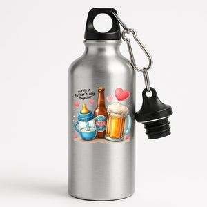 Silver aluminium water bottle with a baby bottle, a beer bottle and a frothy pint with hearts and “Our first Father’s Day together”