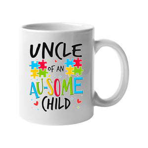 White mug with “Uncle of an AU-SOME child” with colourful puzzle pieces