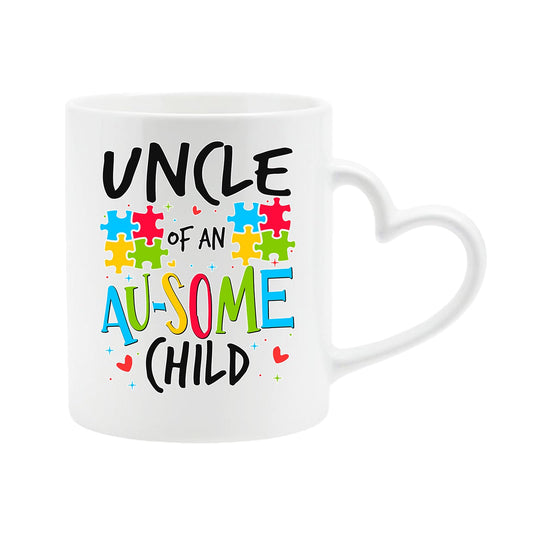 White heart-handle mug with “Uncle of an AU-SOME child” with colourful puzzle pieces