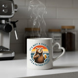 Steaming Dad Bod bear heart-handle mug on a kitchen counter