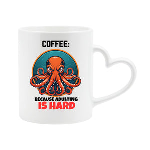 White heart-handle mug with a grumpy orange octopus and “Coffee: because adulting is hard”