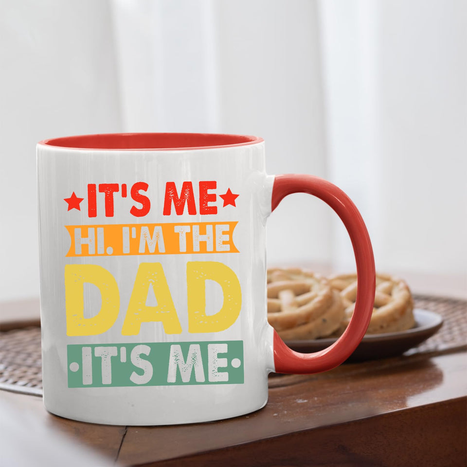 It’s Me Hi I’m the Dad mug with a red handle beside biscuits