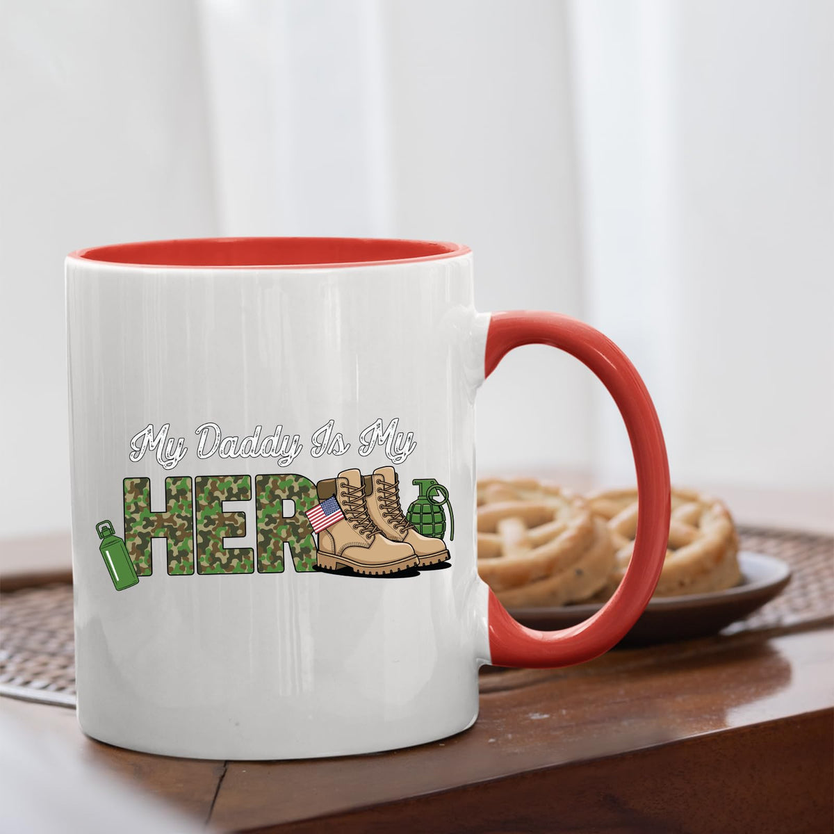 My Daddy Is My Hero military mug with a red handle beside biscuits