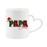 White heart-handle mug with “Papa” in red and green plaid with a Santa hat and “Claus” in script
