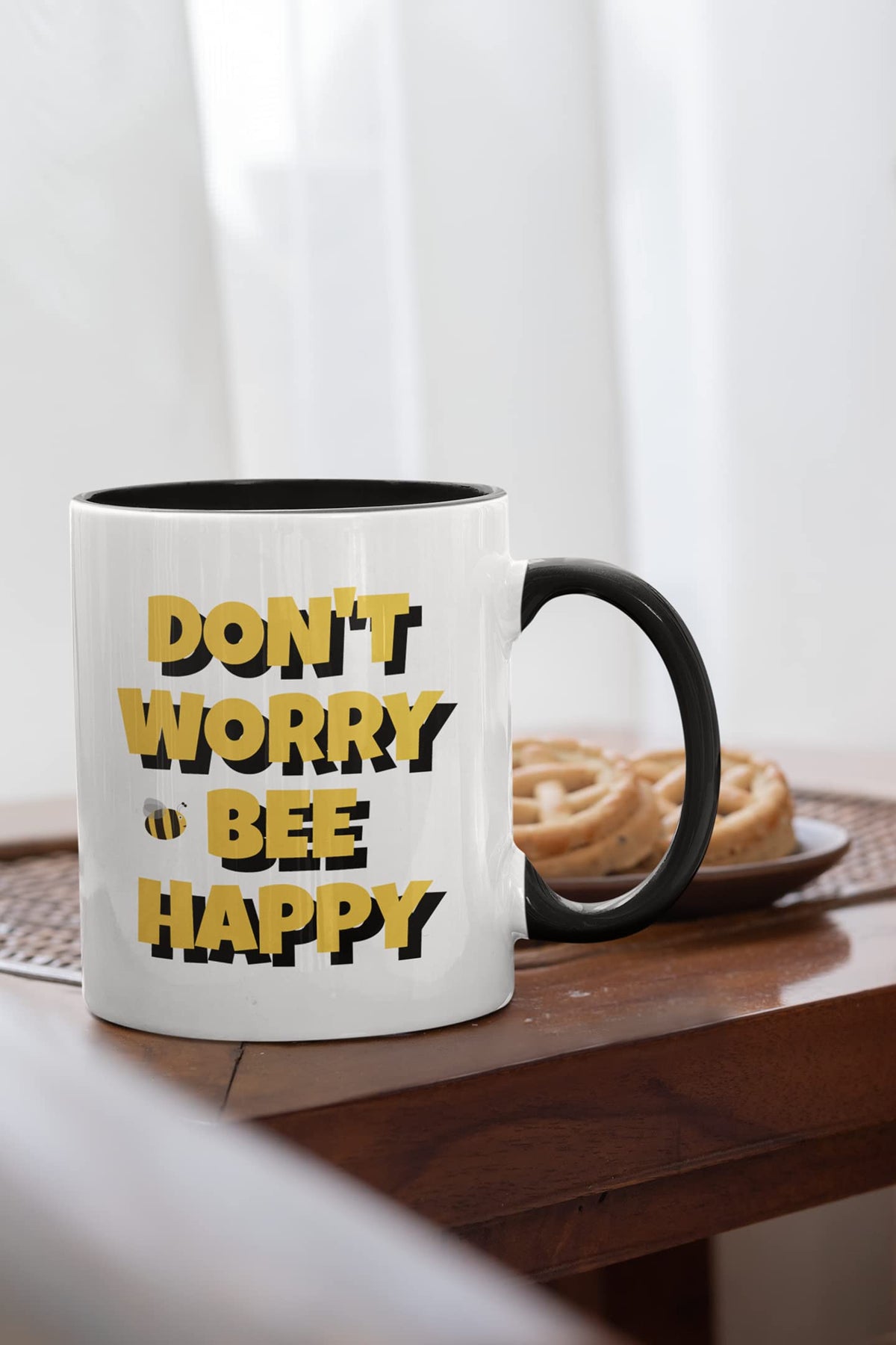 Bee happy mug on a wooden table