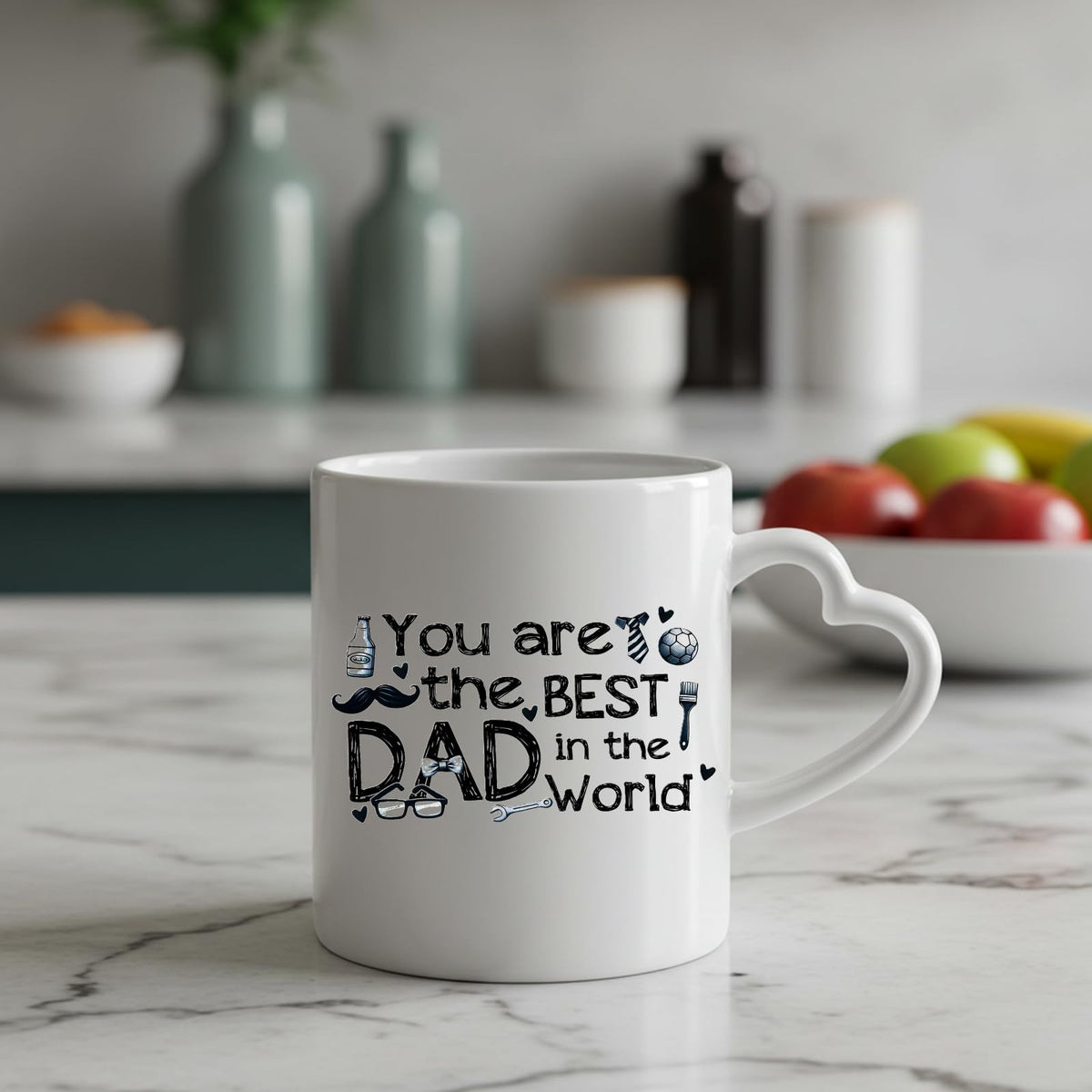 Best Dad in the World sketch heart-handle mug on a marble counter with fruit