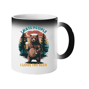 Colour changing mug revealing a bear holding a beer against a retro forest sunset with “I hate people, I love the beer”