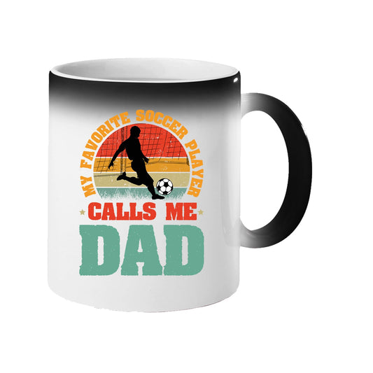 Colour changing mug revealing a footballer in silhouette on a retro sunset with “My favorite soccer player calls me Dad”