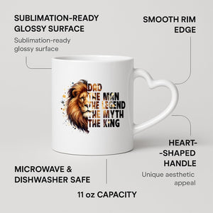 Dad the King lion heart-handle mug on a marble counter with fruit