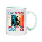 Colour handle mug with a dad and daughter with a bike in silhouette over retro stripes and “Like father, like daughter” – lime handle and inside