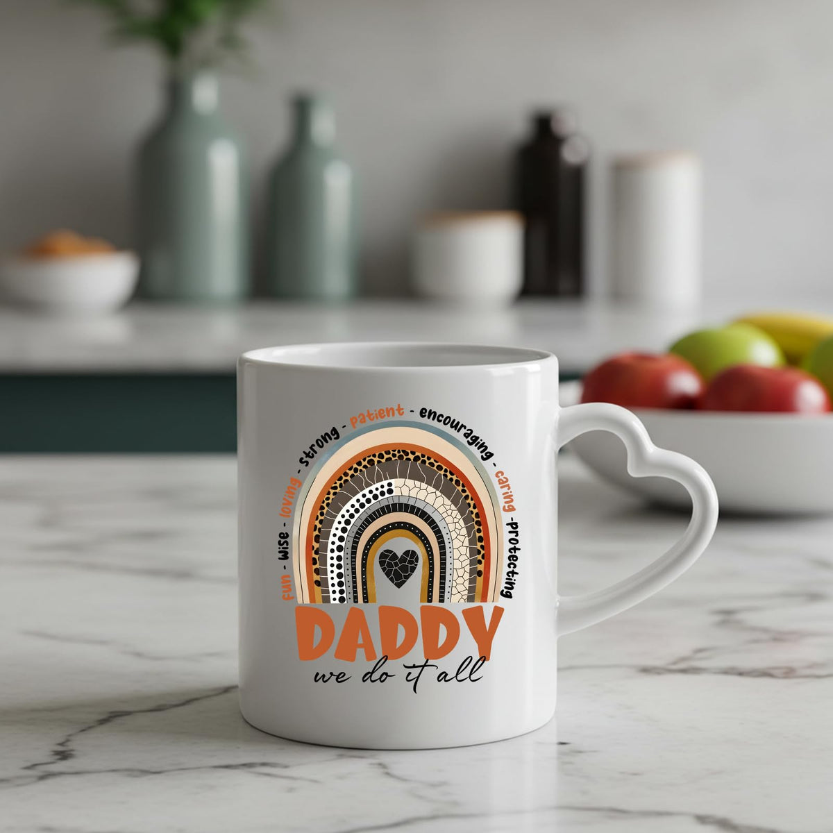 Daddy boho rainbow heart-handle mug on a marble counter with fruit