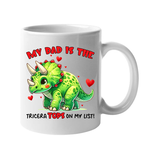 White mug with a green triceratops with hearts and “My dad is the TriceraTOPS on my list!”